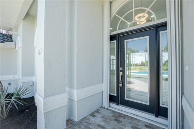 Immaculate Lakefront Pool Home in Prestigious Burnt Store Isles on Twin Isles Country Club in Florida - for sale on GolfHomes.com, golf home, golf lot