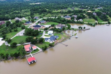 This beautiful lakefront home boasts of 2,605 sf of space on The Club At Runaway Bay in Texas - for sale on GolfHomes.com, golf home, golf lot