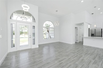 Immaculate Lakefront Pool Home in Prestigious Burnt Store Isles on Twin Isles Country Club in Florida - for sale on GolfHomes.com, golf home, golf lot