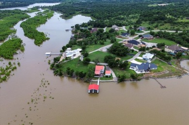 This beautiful lakefront home boasts of 2,605 sf of space on The Club At Runaway Bay in Texas - for sale on GolfHomes.com, golf home, golf lot