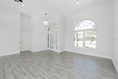 Immaculate Lakefront Pool Home in Prestigious Burnt Store Isles on Twin Isles Country Club in Florida - for sale on GolfHomes.com, golf home, golf lot