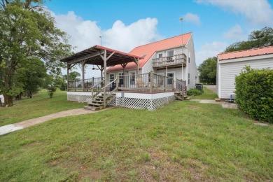 This beautiful lakefront home boasts of 2,605 sf of space on The Club At Runaway Bay in Texas - for sale on GolfHomes.com, golf home, golf lot
