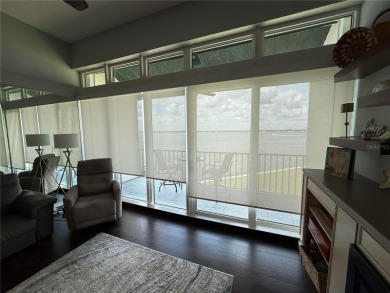 Two-bedroom, two-bath penthouse condo with extra room/office at on Isla Del Sol Yacht and Country Club in Florida - for sale on GolfHomes.com, golf home, golf lot