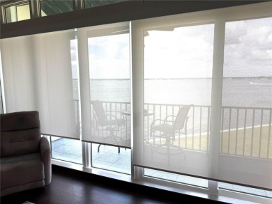 Two-bedroom, two-bath penthouse condo with extra room/office at on Isla Del Sol Yacht and Country Club in Florida - for sale on GolfHomes.com, golf home, golf lot
