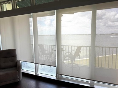 Two-bedroom, two-bath penthouse condo with extra room/office at on Isla Del Sol Yacht and Country Club in Florida - for sale on GolfHomes.com, golf home, golf lot