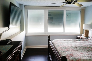 Two-bedroom, two-bath penthouse condo with extra room/office at on Isla Del Sol Yacht and Country Club in Florida - for sale on GolfHomes.com, golf home, golf lot