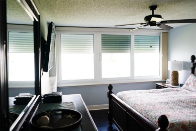 Two-bedroom, two-bath penthouse condo with extra room/office at on Isla Del Sol Yacht and Country Club in Florida - for sale on GolfHomes.com, golf home, golf lot
