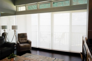 Two-bedroom, two-bath penthouse condo with extra room/office at on Isla Del Sol Yacht and Country Club in Florida - for sale on GolfHomes.com, golf home, golf lot