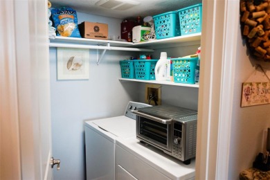 Two-bedroom, two-bath penthouse condo with extra room/office at on Isla Del Sol Yacht and Country Club in Florida - for sale on GolfHomes.com, golf home, golf lot