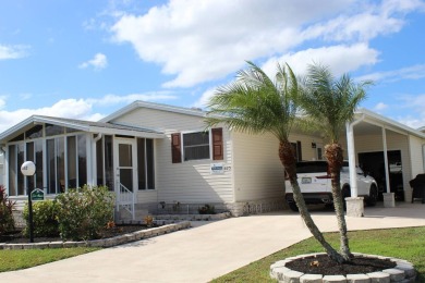 What a pretty curb apeal when entering this 2 bedroom home. ( on Schalamar Creek Golf and Country Club in Florida - for sale on GolfHomes.com, golf home, golf lot