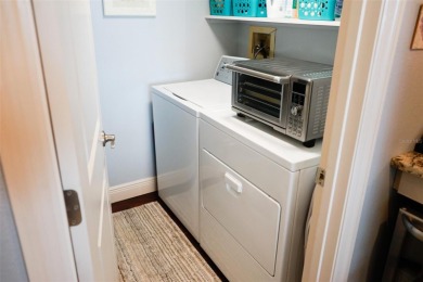 Two-bedroom, two-bath penthouse condo with extra room/office at on Isla Del Sol Yacht and Country Club in Florida - for sale on GolfHomes.com, golf home, golf lot