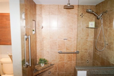 Two-bedroom, two-bath penthouse condo with extra room/office at on Isla Del Sol Yacht and Country Club in Florida - for sale on GolfHomes.com, golf home, golf lot