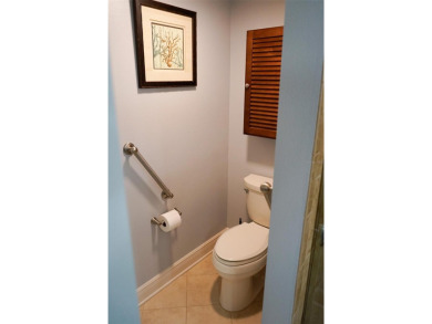 Two-bedroom, two-bath penthouse condo with extra room/office at on Isla Del Sol Yacht and Country Club in Florida - for sale on GolfHomes.com, golf home, golf lot