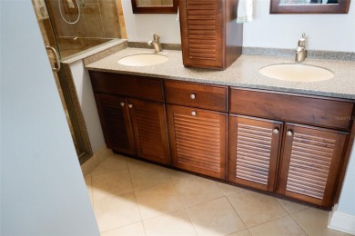 Two-bedroom, two-bath penthouse condo with extra room/office at on Isla Del Sol Yacht and Country Club in Florida - for sale on GolfHomes.com, golf home, golf lot