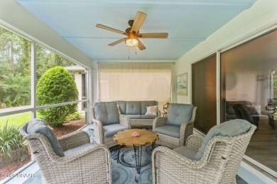 Walk in to an amazingly well-renovated home with tons of charm! on LPGA International Golf Course in Florida - for sale on GolfHomes.com, golf home, golf lot