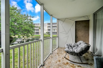 Discover the perfect first-floor corner unit with a tranquil on Presidential Estate Golf Course in Florida - for sale on GolfHomes.com, golf home, golf lot