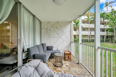 Discover the perfect first-floor corner unit with a tranquil on Presidential Estate Golf Course in Florida - for sale on GolfHomes.com, golf home, golf lot