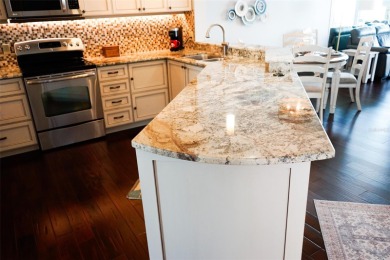 Two-bedroom, two-bath penthouse condo with extra room/office at on Isla Del Sol Yacht and Country Club in Florida - for sale on GolfHomes.com, golf home, golf lot