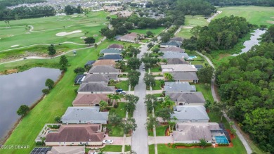 Walk in to an amazingly well-renovated home with tons of charm! on LPGA International Golf Course in Florida - for sale on GolfHomes.com, golf home, golf lot