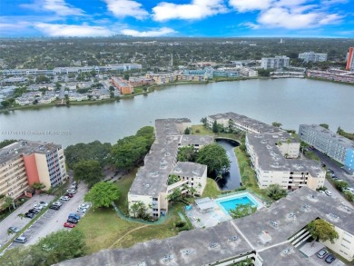 Discover the perfect first-floor corner unit with a tranquil on Presidential Estate Golf Course in Florida - for sale on GolfHomes.com, golf home, golf lot