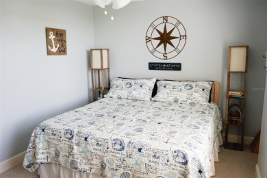 Two-bedroom, two-bath penthouse condo with extra room/office at on Isla Del Sol Yacht and Country Club in Florida - for sale on GolfHomes.com, golf home, golf lot