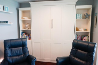 Two-bedroom, two-bath penthouse condo with extra room/office at on Isla Del Sol Yacht and Country Club in Florida - for sale on GolfHomes.com, golf home, golf lot