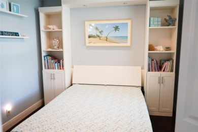 Two-bedroom, two-bath penthouse condo with extra room/office at on Isla Del Sol Yacht and Country Club in Florida - for sale on GolfHomes.com, golf home, golf lot