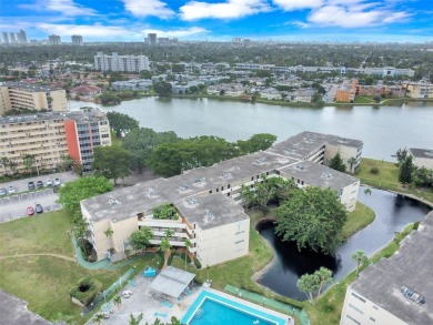 Discover the perfect first-floor corner unit with a tranquil on Presidential Estate Golf Course in Florida - for sale on GolfHomes.com, golf home, golf lot