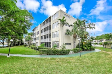 Discover the perfect first-floor corner unit with a tranquil on Presidential Estate Golf Course in Florida - for sale on GolfHomes.com, golf home, golf lot