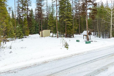 Spacious, level 0.65-acre lot located in the desirable Marvin on Priest Lake Golf and Tennis Club in Idaho - for sale on GolfHomes.com, golf home, golf lot