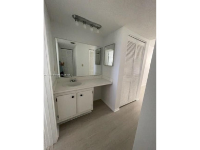 This 1 bed/1.5 bath condo on the top floor features a on Pine Island Ridge Country Club in Florida - for sale on GolfHomes.com, golf home, golf lot