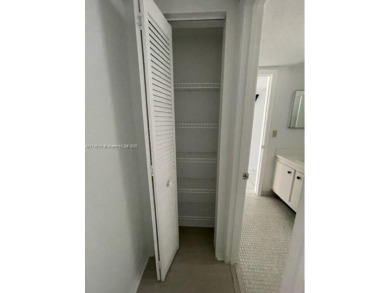 This 1 bed/1.5 bath condo on the top floor features a on Pine Island Ridge Country Club in Florida - for sale on GolfHomes.com, golf home, golf lot