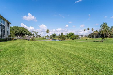 Welcome to this charming 2-bedroom, 2-bathroom condominium on Wynmoor Golf Course in Florida - for sale on GolfHomes.com, golf home, golf lot