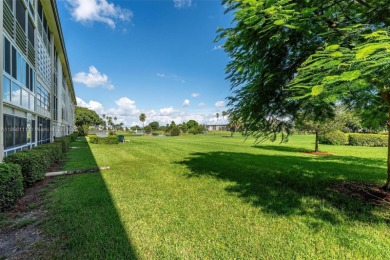 Welcome to this charming 2-bedroom, 2-bathroom condominium on Wynmoor Golf Course in Florida - for sale on GolfHomes.com, golf home, golf lot