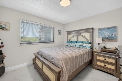 Must see! Highly desirable Cypress Bend community! Completely on Palm-Aire Country Club and Resort - Palms in Florida - for sale on GolfHomes.com, golf home, golf lot