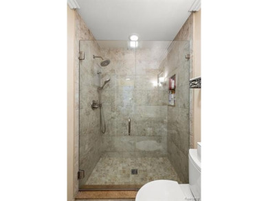 Experience luxury living in this beautifully renovated colonial on Forest Lake Country Club in Michigan - for sale on GolfHomes.com, golf home, golf lot
