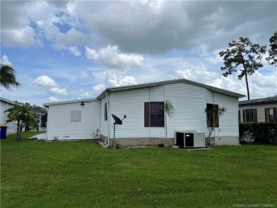 LOCATION! BRAND NEW WINDOWS! This home backs up to the on Indianwood Golf and Country Club in Florida - for sale on GolfHomes.com, golf home, golf lot