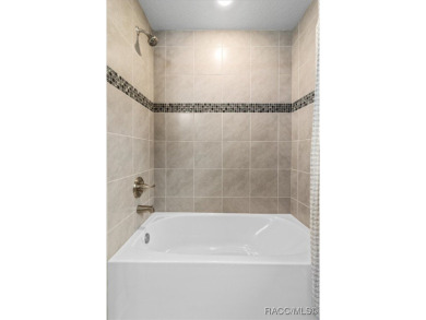 Step into Florida living at its finest with this beautifully on Citrus Hills Golf Club in Florida - for sale on GolfHomes.com, golf home, golf lot