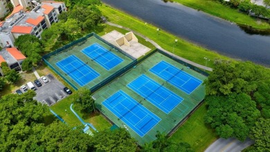 Must see! Highly desirable Cypress Bend community! Completely on Palm-Aire Country Club and Resort - Palms in Florida - for sale on GolfHomes.com, golf home, golf lot