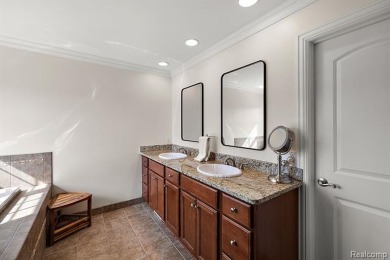 Experience luxury living in this beautifully renovated colonial on Forest Lake Country Club in Michigan - for sale on GolfHomes.com, golf home, golf lot