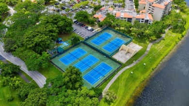 Must see! Highly desirable Cypress Bend community! Completely on Palm-Aire Country Club and Resort - Palms in Florida - for sale on GolfHomes.com, golf home, golf lot