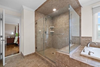 Experience luxury living in this beautifully renovated colonial on Forest Lake Country Club in Michigan - for sale on GolfHomes.com, golf home, golf lot