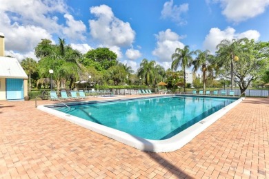 Must see! Highly desirable Cypress Bend community! Completely on Palm-Aire Country Club and Resort - Palms in Florida - for sale on GolfHomes.com, golf home, golf lot
