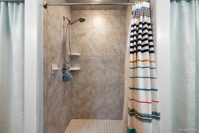 Experience luxury living in this beautifully renovated colonial on Forest Lake Country Club in Michigan - for sale on GolfHomes.com, golf home, golf lot