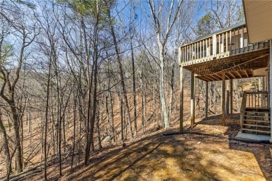 Welcome home to your own private mountainside retreat in Lake on The Highlands Course at Lake Arrowhead in Georgia - for sale on GolfHomes.com, golf home, golf lot