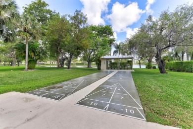 Must see! Highly desirable Cypress Bend community! Completely on Palm-Aire Country Club and Resort - Palms in Florida - for sale on GolfHomes.com, golf home, golf lot