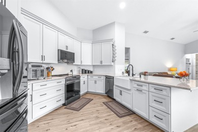 One or more photo(s) has been virtually staged. Tucked away at on Fox Hollow Golf Club in Florida - for sale on GolfHomes.com, golf home, golf lot