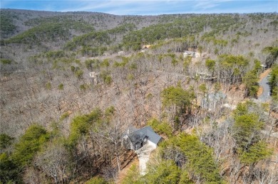 Welcome home to your own private mountainside retreat in Lake on The Highlands Course at Lake Arrowhead in Georgia - for sale on GolfHomes.com, golf home, golf lot