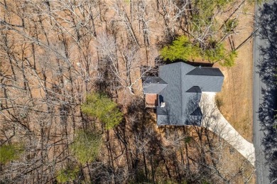 Welcome home to your own private mountainside retreat in Lake on The Highlands Course at Lake Arrowhead in Georgia - for sale on GolfHomes.com, golf home, golf lot