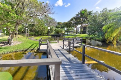 Must see! Highly desirable Cypress Bend community! Completely on Palm-Aire Country Club and Resort - Palms in Florida - for sale on GolfHomes.com, golf home, golf lot